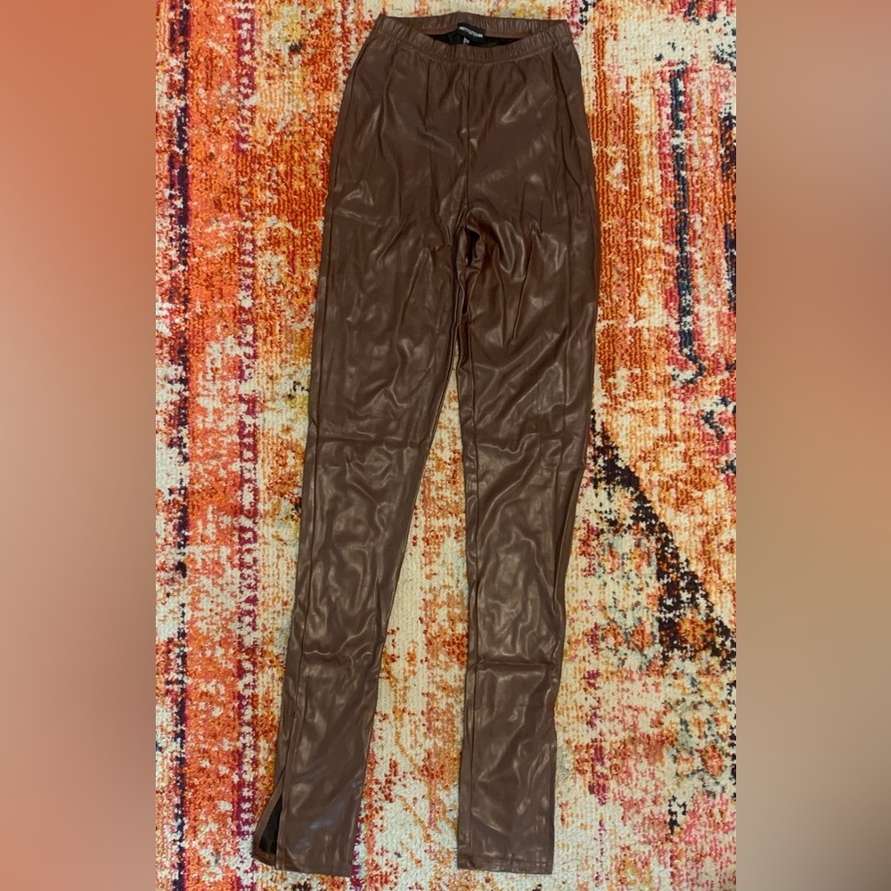 Pretty Little Thing Brown Faux Leather Pants w/ 8in cut leg detail (Sz 6)